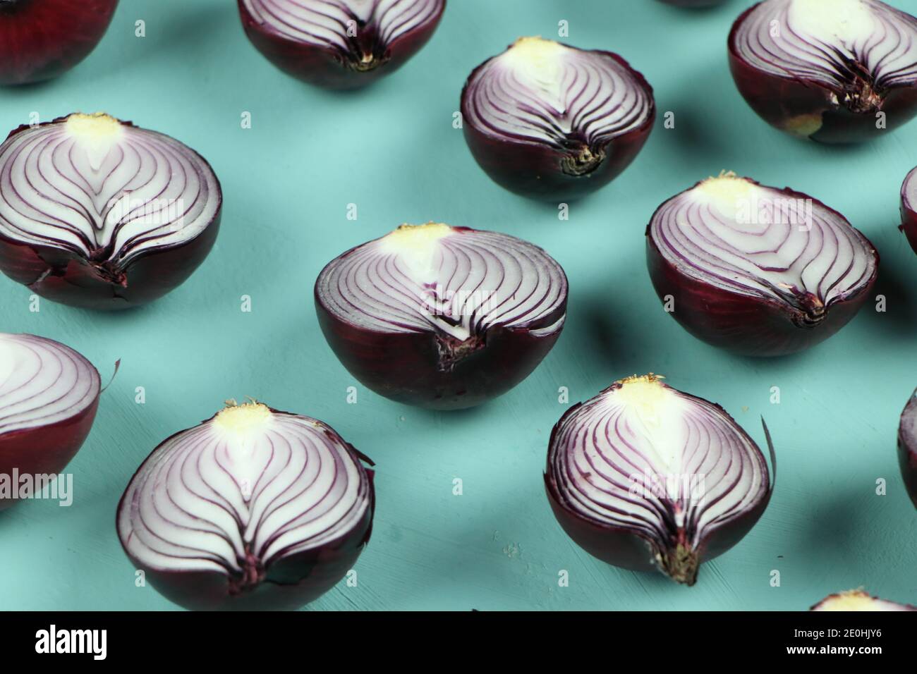 sweet red onions on background Stock Photo