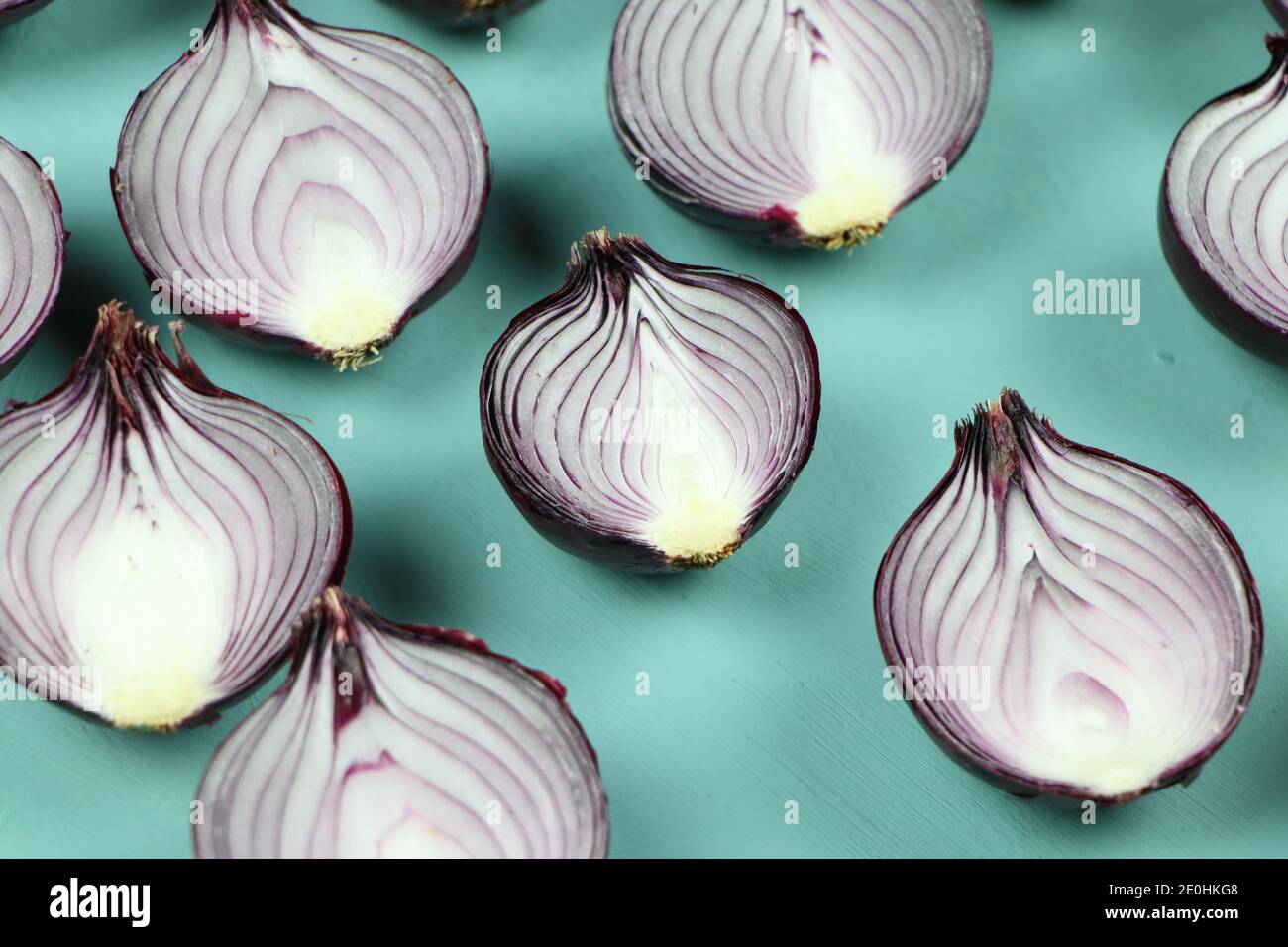 sweet red onions on background Stock Photo