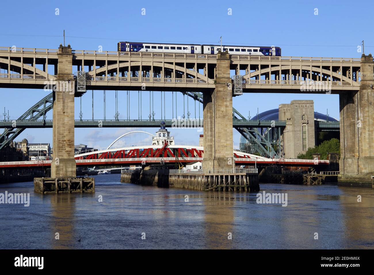 Northern Trains Limited train crossing the High Level Bridge over the River Tyne in newcastle Upon Tyne, England Stock Photo