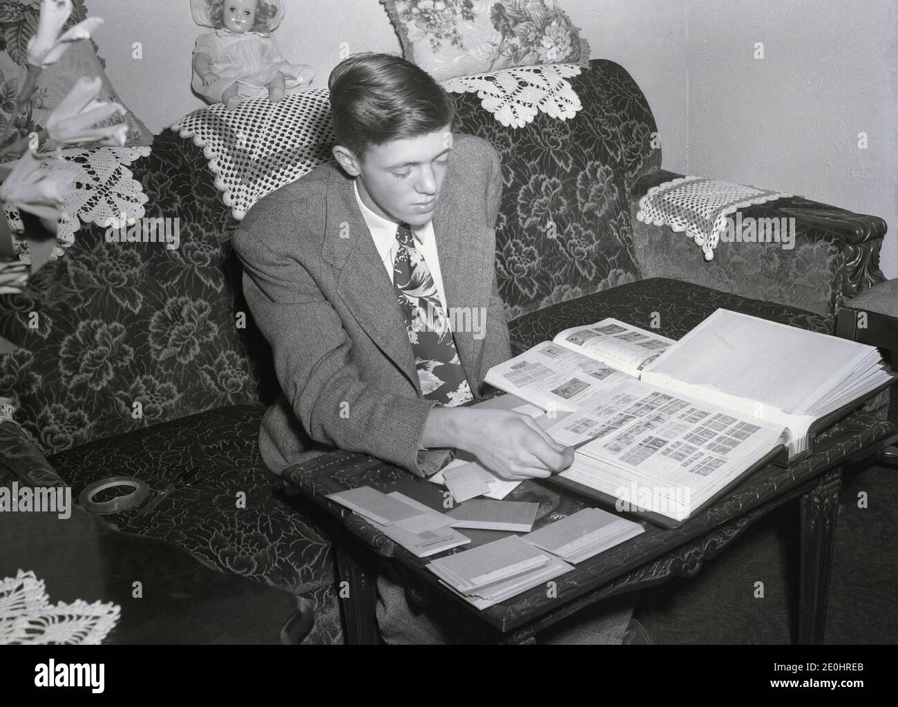 1948, historical, a smartly dressed young man in a jacket and tie