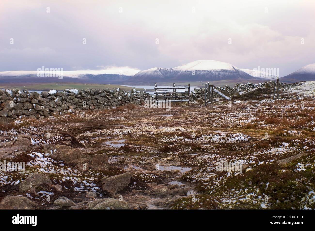 Snow on tops of hills on Orkney islands in northern Scotland in winter morning Stock Photo