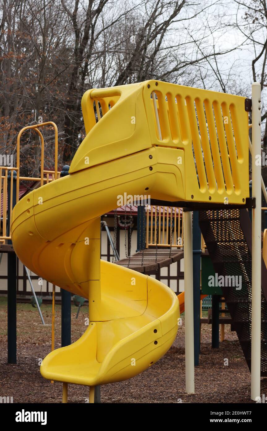 Children love to play on the playground equipment. Stock Photo