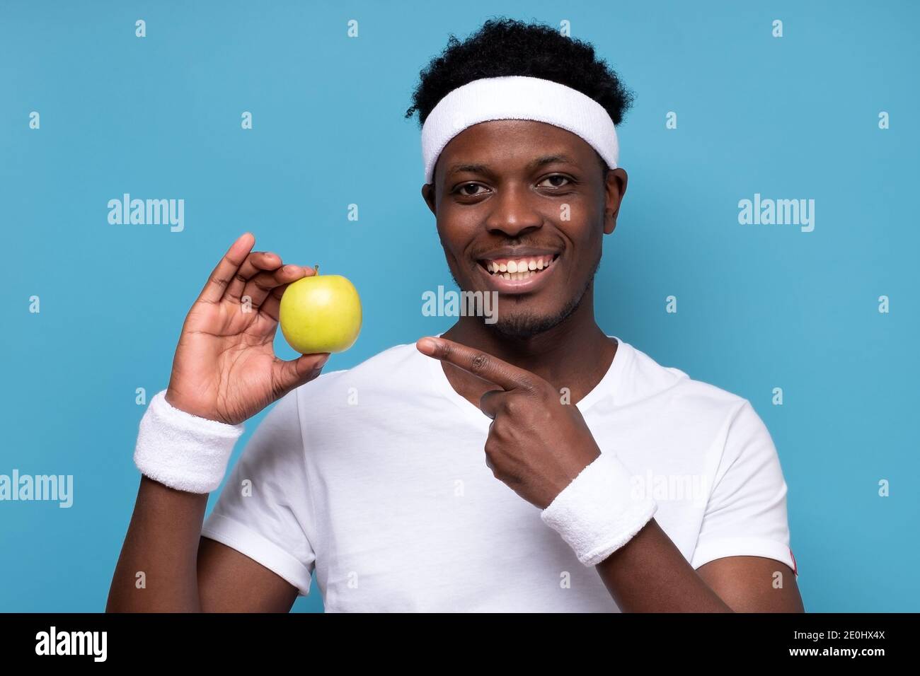 Happy pleased young african sportsman hi-res stock photography and ...