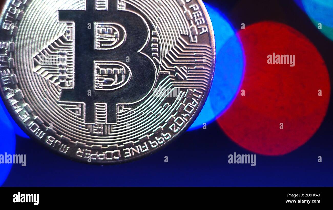 Bitcoin on blue chart hi-res stock photography and images - Alamy