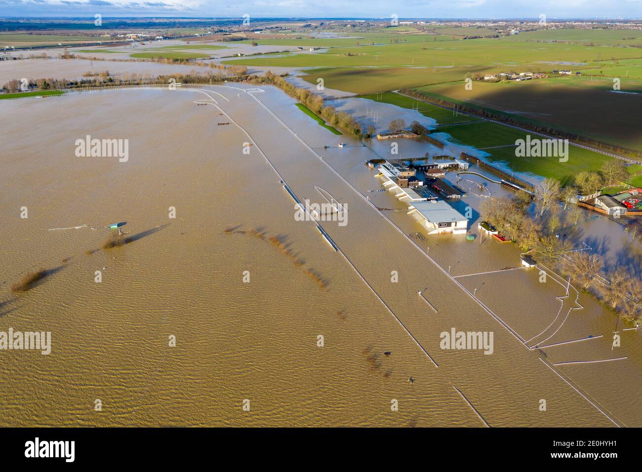 Picture dated December 24th shows Huntingdon Racecourse in Cambridgeshire under water on Thursday afternoon after the heavy rainfall caused flooding in the region with more bad weather forecast for Boxing Day.   Weather warnings are in place for large parts of the UK on Boxing Day, with Storm Bella expected to bring heavy rain and winds of up to 80mph.  It comes as parts of the country have already seen flooding in the past few days, with emergency services receiving hundreds of calls.  Christmas Day will be calm and cold, with a very minimal chance of snow, according to the Met Office. Howeve Stock Photo