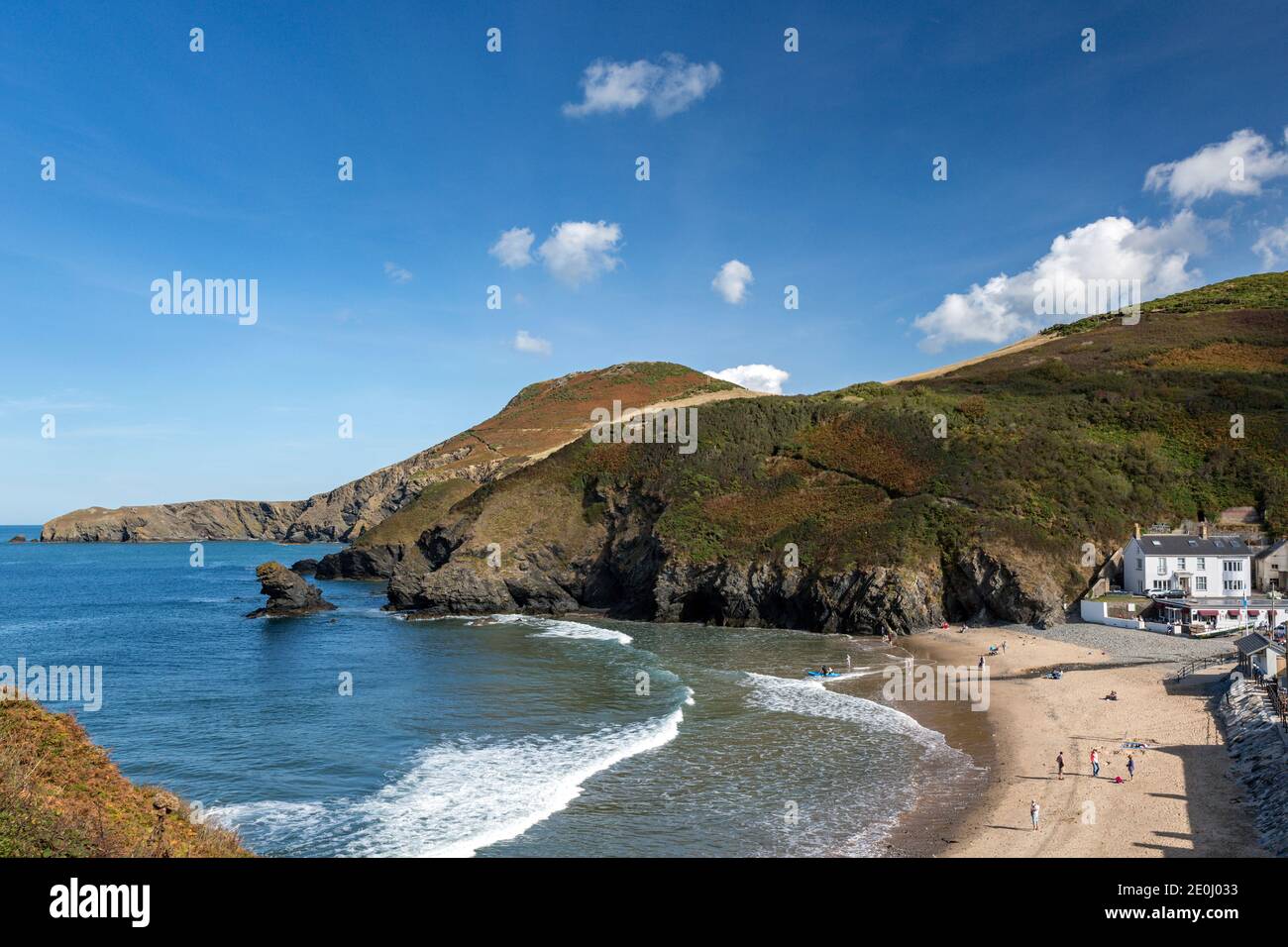 Llangrannog is a small, coastal village and seaside resort in Ceredigion, seven miles south of New Quay on the Wales Coast Path. Stock Photo