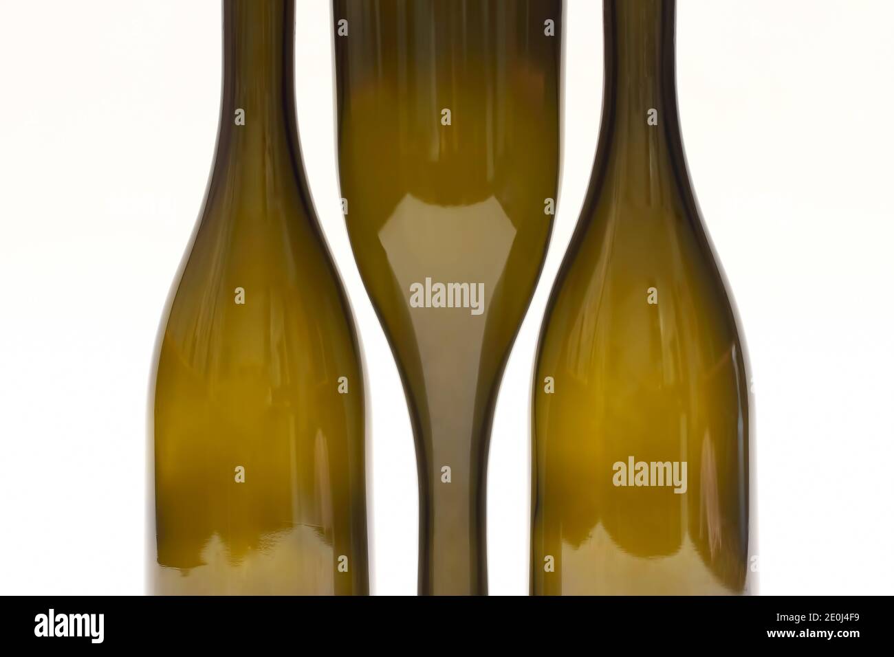 Three empty wine bottles close up on white background Stock Photo Alamy