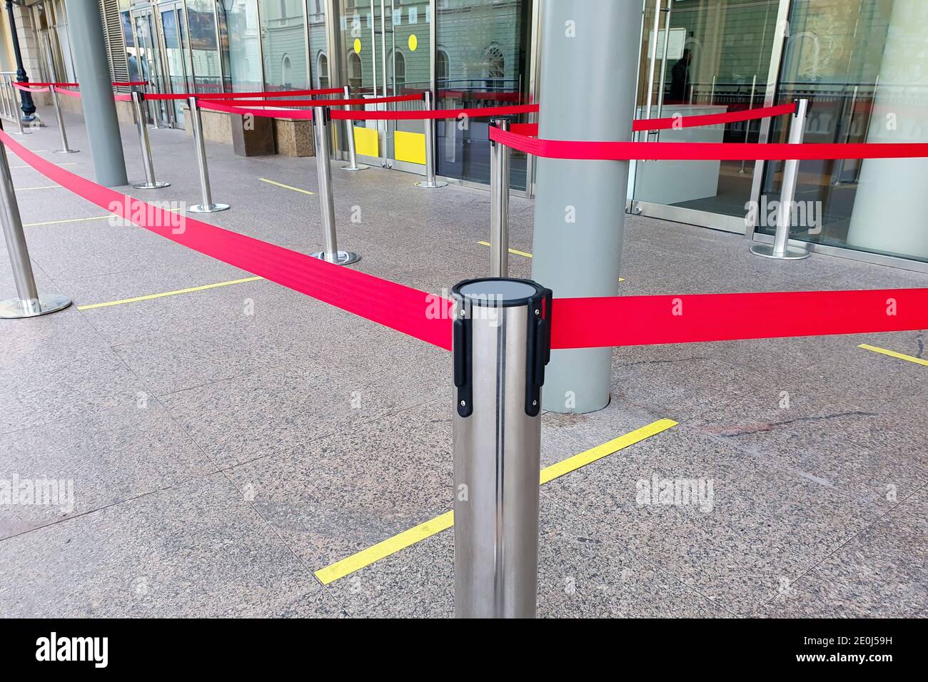 Security Ribbon Empty paths bounded by a red ribbon. Tape security at the airport Stock ...