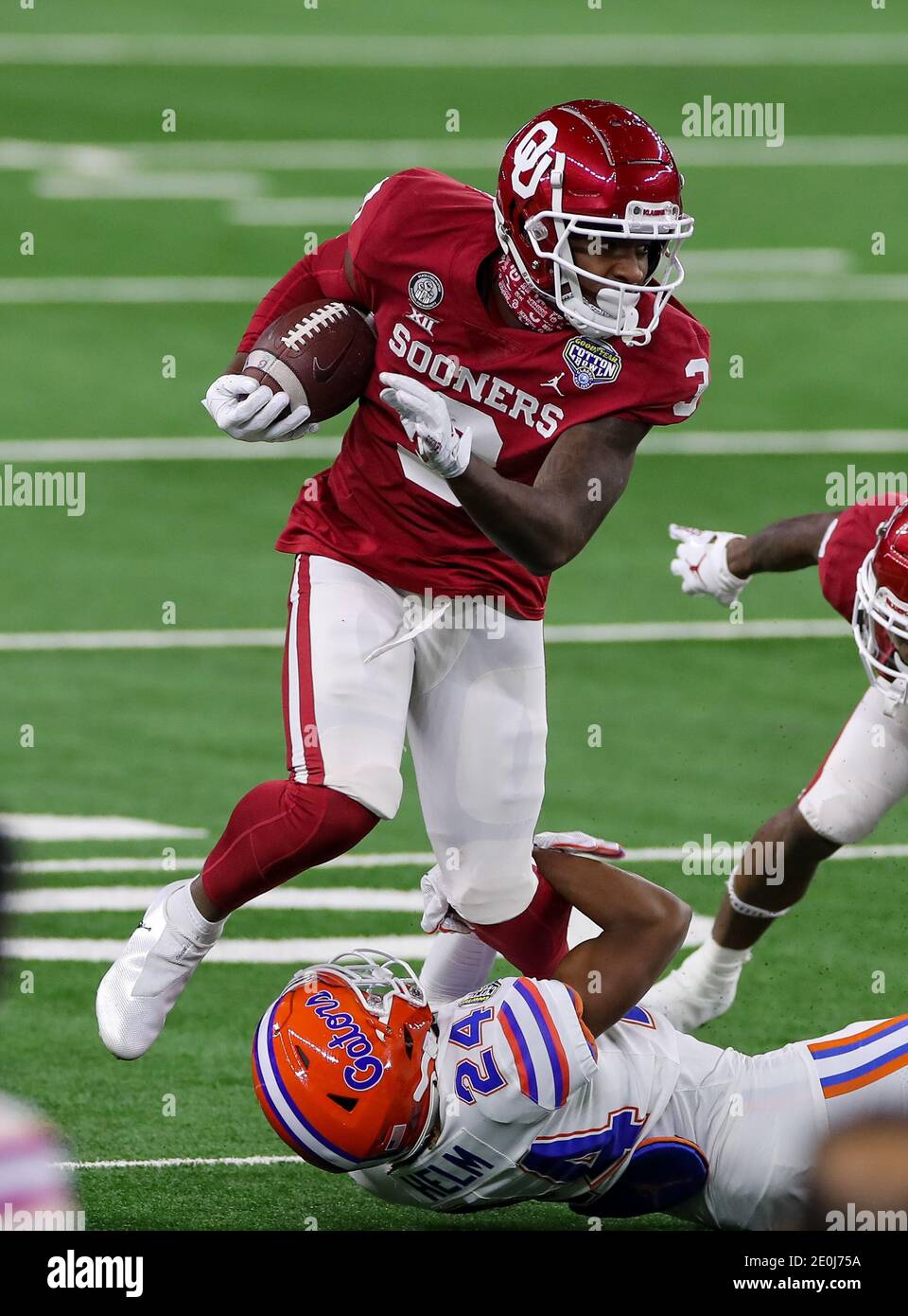 Arlington, TX, USA. 30th Dec, 2020. Oklahoma Sooners tight end Mikey Henderson (3) runs through a tackle in action during the Florida Gators, versus the Oklahoma Sooners college football game, at the Goodyear Cotton Bowl, in Arlington, Texas on December 30, 2020. The Sooners won the game 55-20. (Mandatory Credit: Freddie Beckwith/MarinMedia.org/Cal Sport Media) (Absolute Complete photographer, and credits required).Television, or For-Profit magazines Contact MarinMedia directly. Credit: csm/Alamy Live News Stock Photo