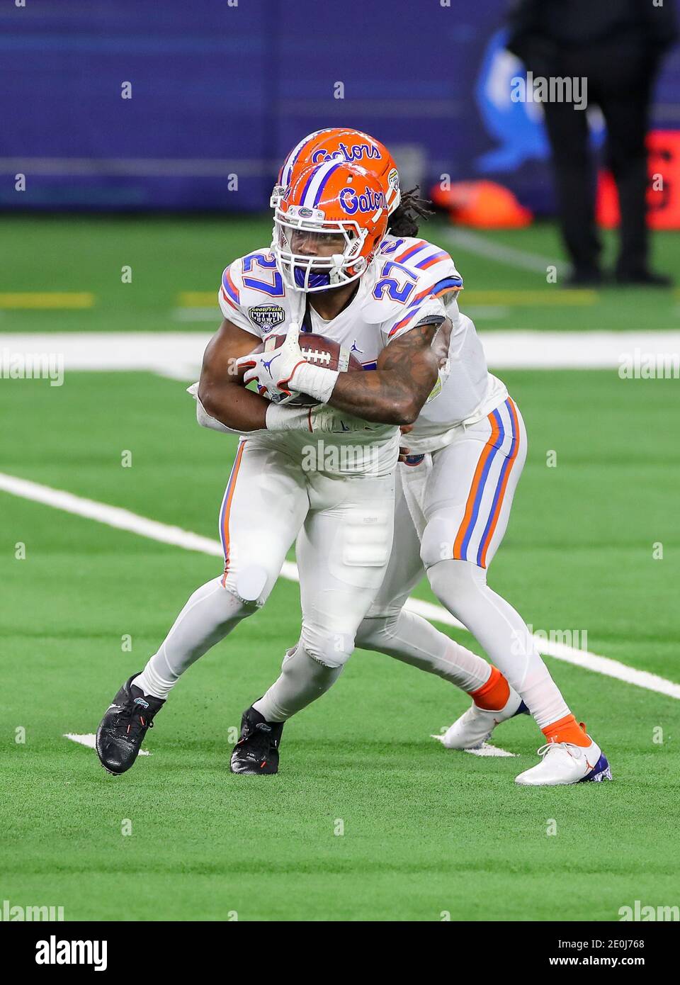 Arlington, TX, USA. 30th Dec, 2020. Florida Gators running back Dameon Pierce (27) takes the handoff in action during the Florida Gators, versus the Oklahoma Sooners college football game, at the Goodyear Cotton Bowl, in Arlington, Texas on December 30, 2020. The Sooners won the game 55-20. (Mandatory Credit: Freddie Beckwith/MarinMedia.org/Cal Sport Media) (Absolute Complete photographer, and credits required).Television, or For-Profit magazines Contact MarinMedia directly. Credit: csm/Alamy Live News Stock Photo