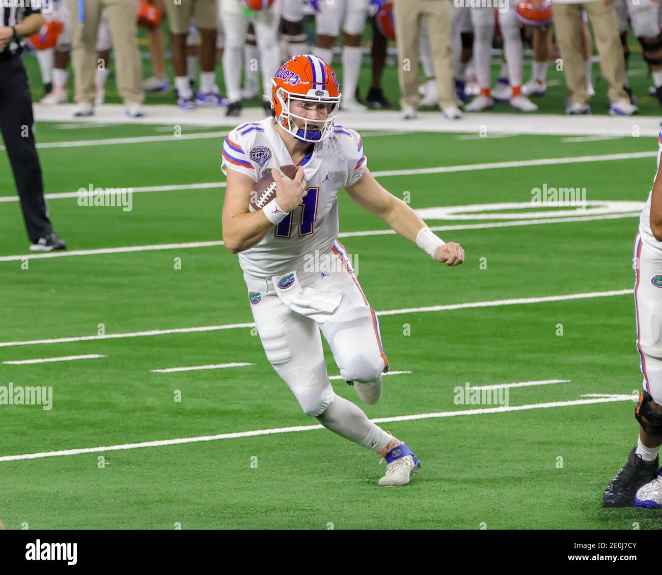 Arlington, TX, USA. 30th Dec, 2020. Florida Gators quarterback Kyle Trask (11) runs the ball in action during the Florida Gators, versus the Oklahoma Sooners college football game, at the Goodyear Cotton Bowl, in Arlington, Texas on December 30, 2020. The Sooners won the game 55-20. (Mandatory Credit: Freddie Beckwith/MarinMedia.org/Cal Sport Media) (Absolute Complete photographer, and credits required).Television, or For-Profit magazines Contact MarinMedia directly. Credit: csm/Alamy Live News Stock Photo