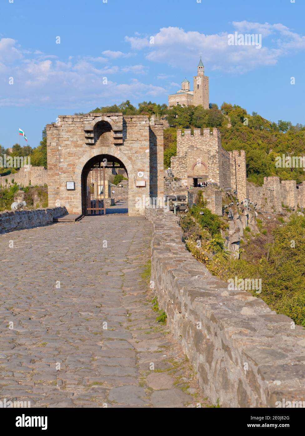 Main gate of Tsarevets fortress on the hill with same name in Veliko Tarnovo, Bulgaria. Patriarchal Cathedral of the Holy Ascension of the Lord on top Stock Photo