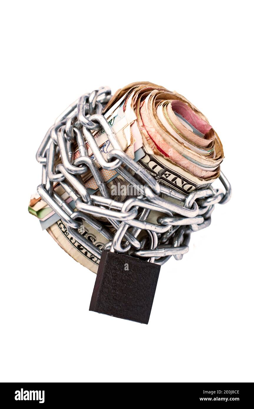 Money concept, roll of money locked in chains Stock Photo Alamy