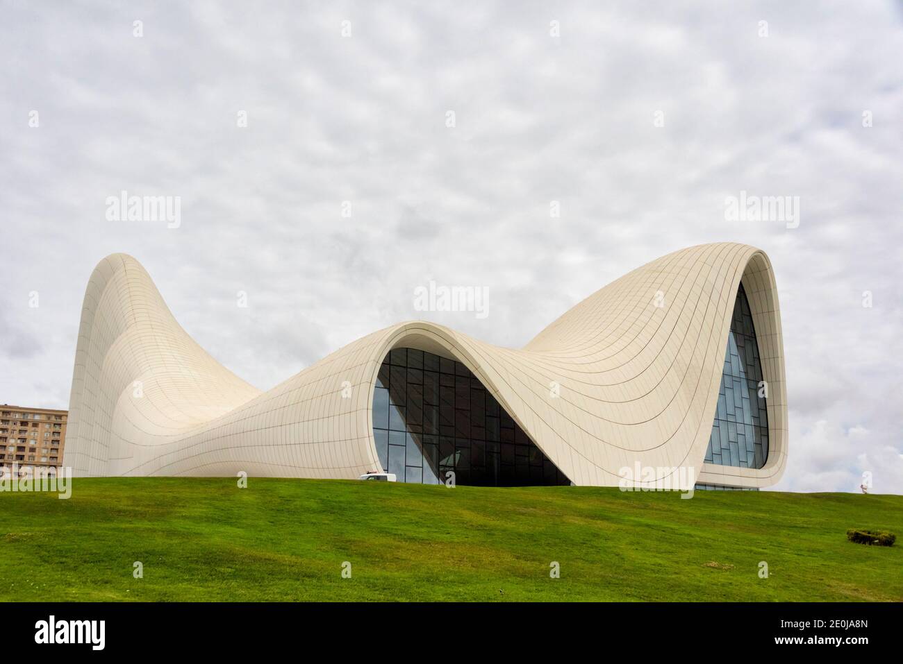 Heydar Aliyev Center designed by Iraqi-British architect Zaha Haid, famous for its distinctive architecture and flowing, curved style that avoids shar Stock Photo