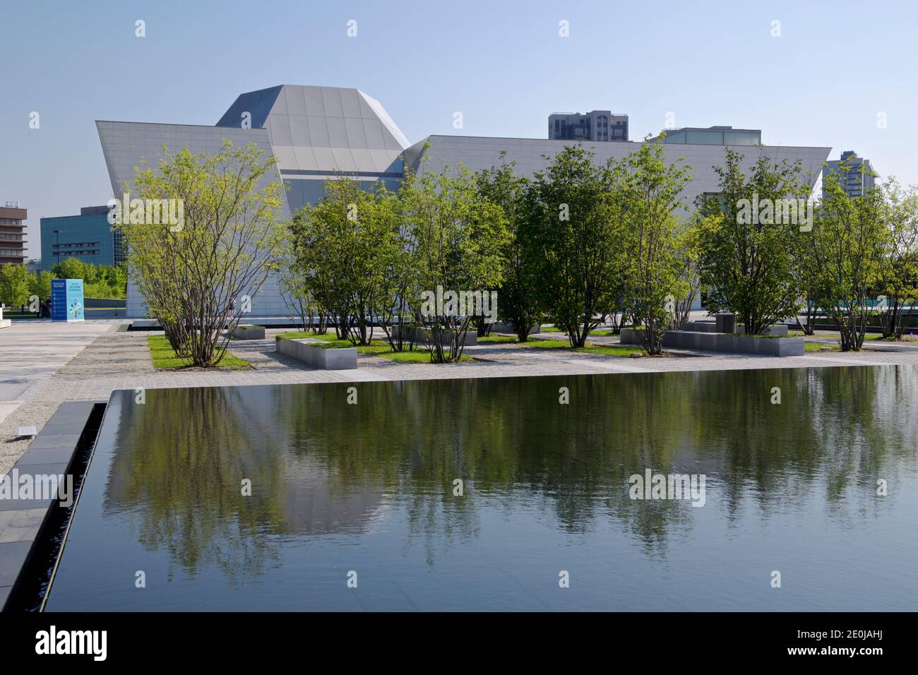 The exterior of the contemporary building with reflection in the water Stock Photo