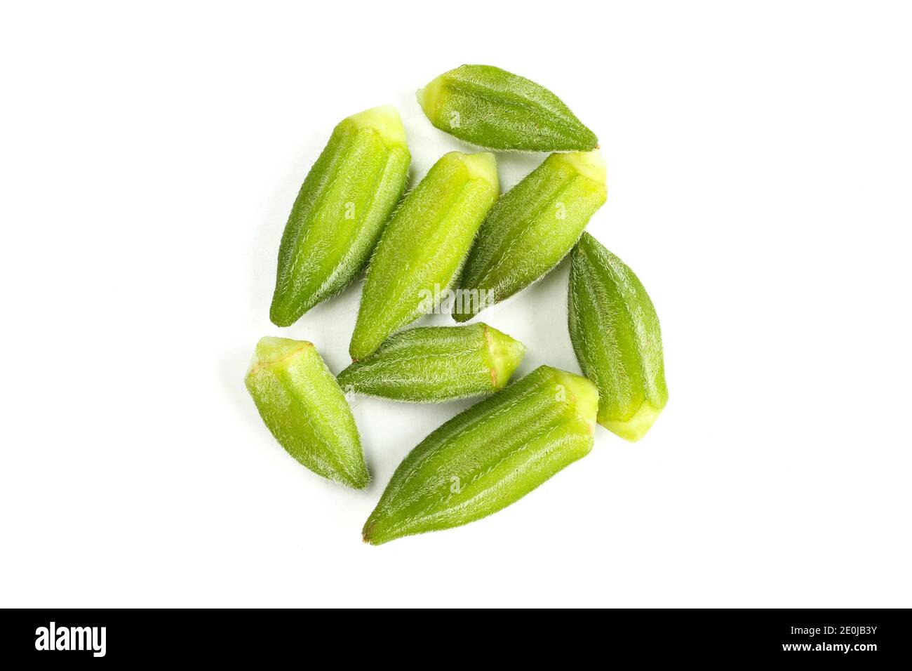 Group of isolated okra seeds isolated on white background. Fresh raw