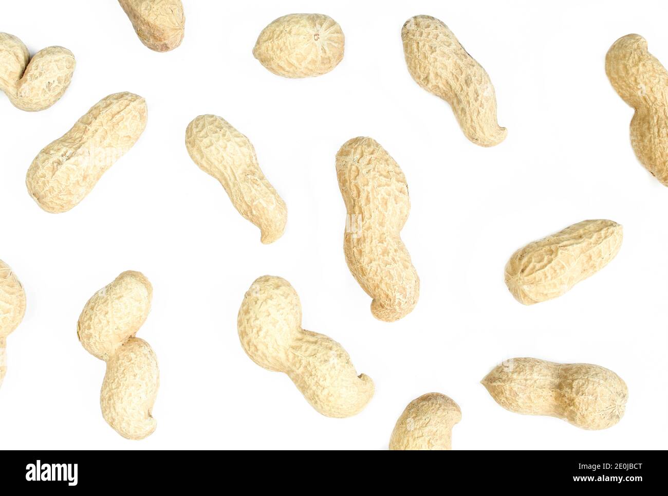Wallpaper/texture made of peanuts in shell isolated on white background