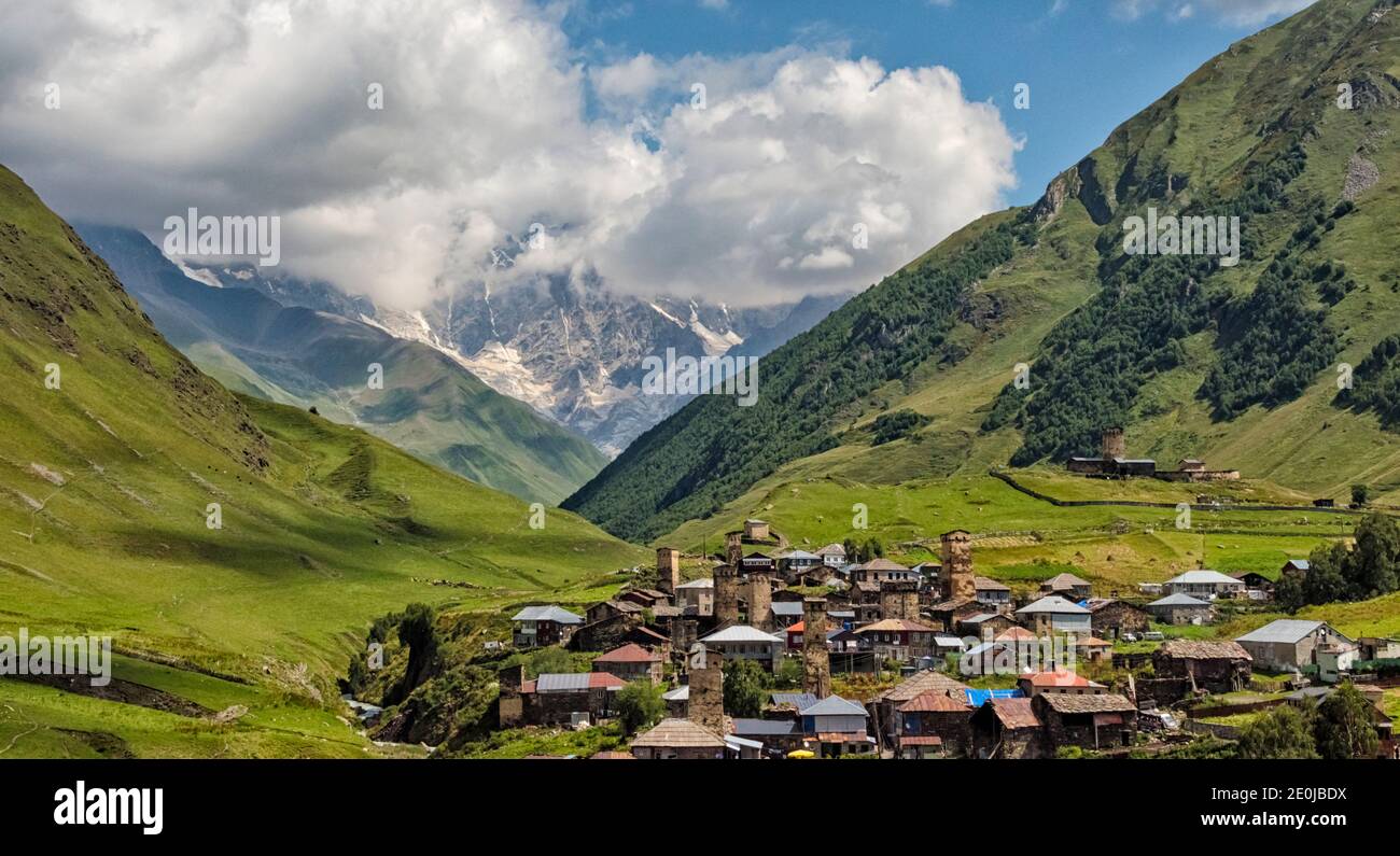 Svan houses with medieval watchtower in the Caucasus Mountain, Ushguli, Svaneti region, Georgia Stock Photo