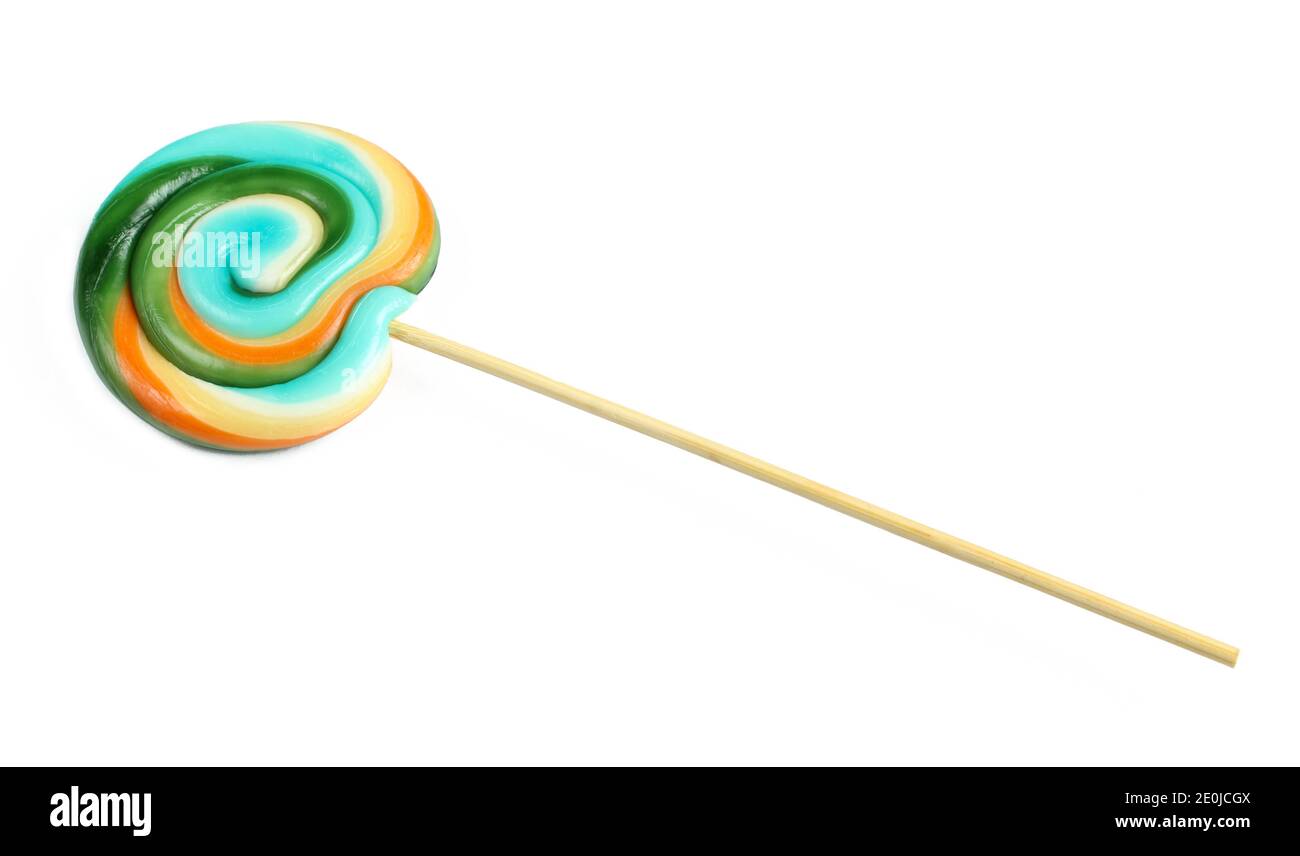 Colorful circle shaped lollipop isolated on white background. Delicious sucker on wooden stick Stock Photo