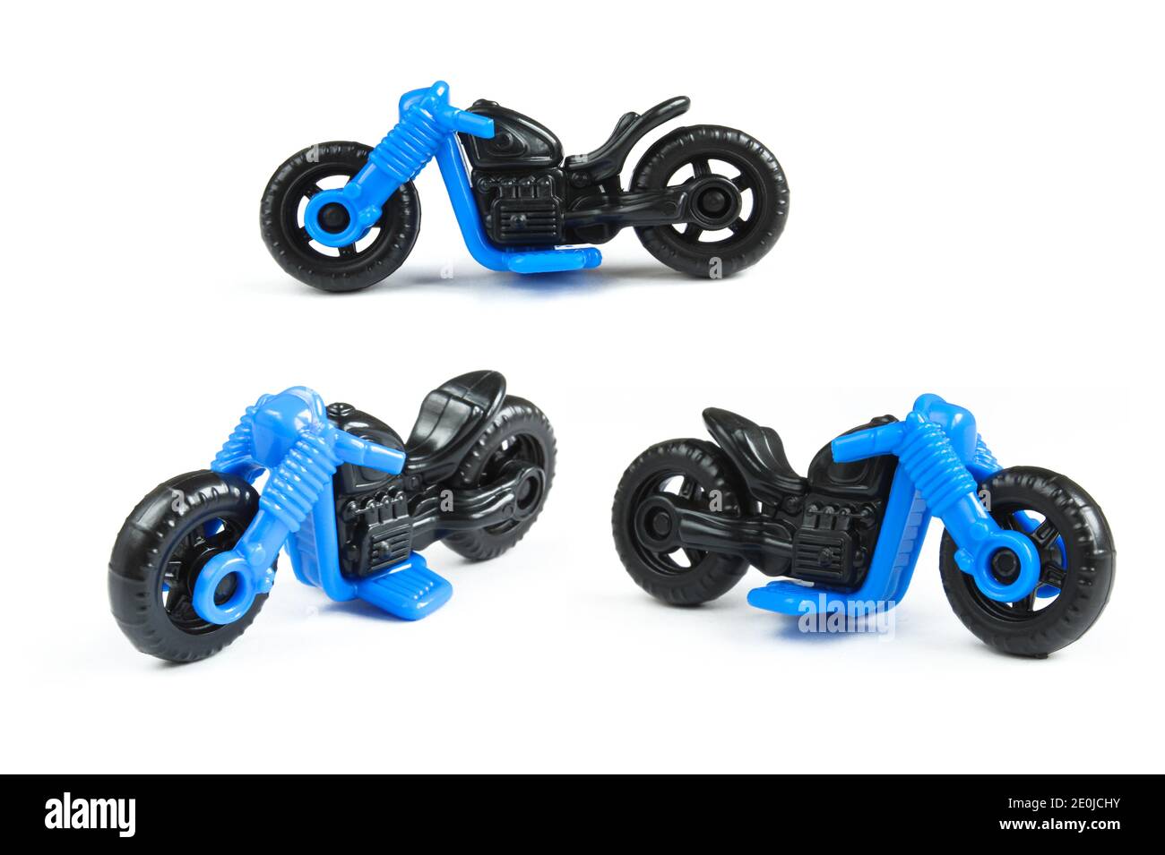 Black and blue motorbike toy isolated on white background. Plastic chopper motorcycle for kids play Stock Photo