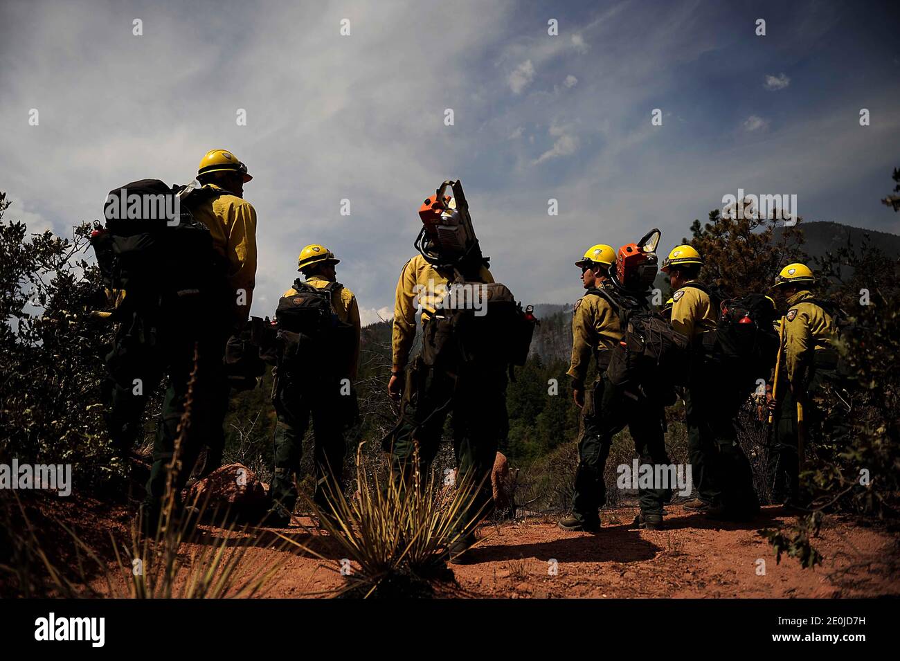 Vandenberg Air Force Base Hot Shot fire fighters prepare to cut a fire line on June 28, 2012 in the Mount Saint Francois area of Colorado Springs, Co. while helping to battle several fires in Waldo Canyon. The Waldo Canyon fire has grown to 18,500 acres and burned over 300 homes. Currently, more than 90 firefighters from the Academy, along with assets from Air Force Space Command; F.E. Warren Air Force Base, Wyo.; Fort Carson, Colo.; and the local community continue to fight the Waldo Canyon fire. Photo by U.S. Air Force via ABACAPRESS.COM Stock Photo