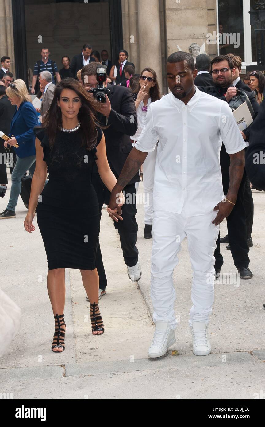 Kim Kardashian and Kanye West attending the Valentino Haute-Couture Show as  part of Paris Fashion Week Fall-Winter 2012-2013 held at the Hotel Salomon  de Rothschild on July 4, 2012 in Paris, France.