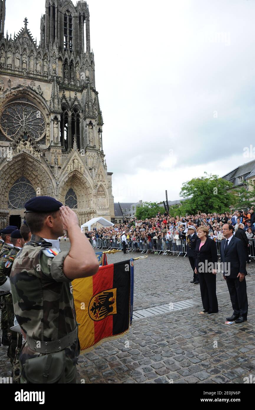 German Chancellor Angela Merkel and French President Francois Hollande celebrate 50th anniversary of renewed Franco-German relations after World War II near the Cathedral Reims cathedral, eastern France, on July 8, 2012. The post-war reconciliation is symbolically achieved in 1962 on July 8 by then French president Charles de Gaulle and former chancellor Konrad Adenauer. Photo by Mousse/ABACAPRESS.COM Stock Photo