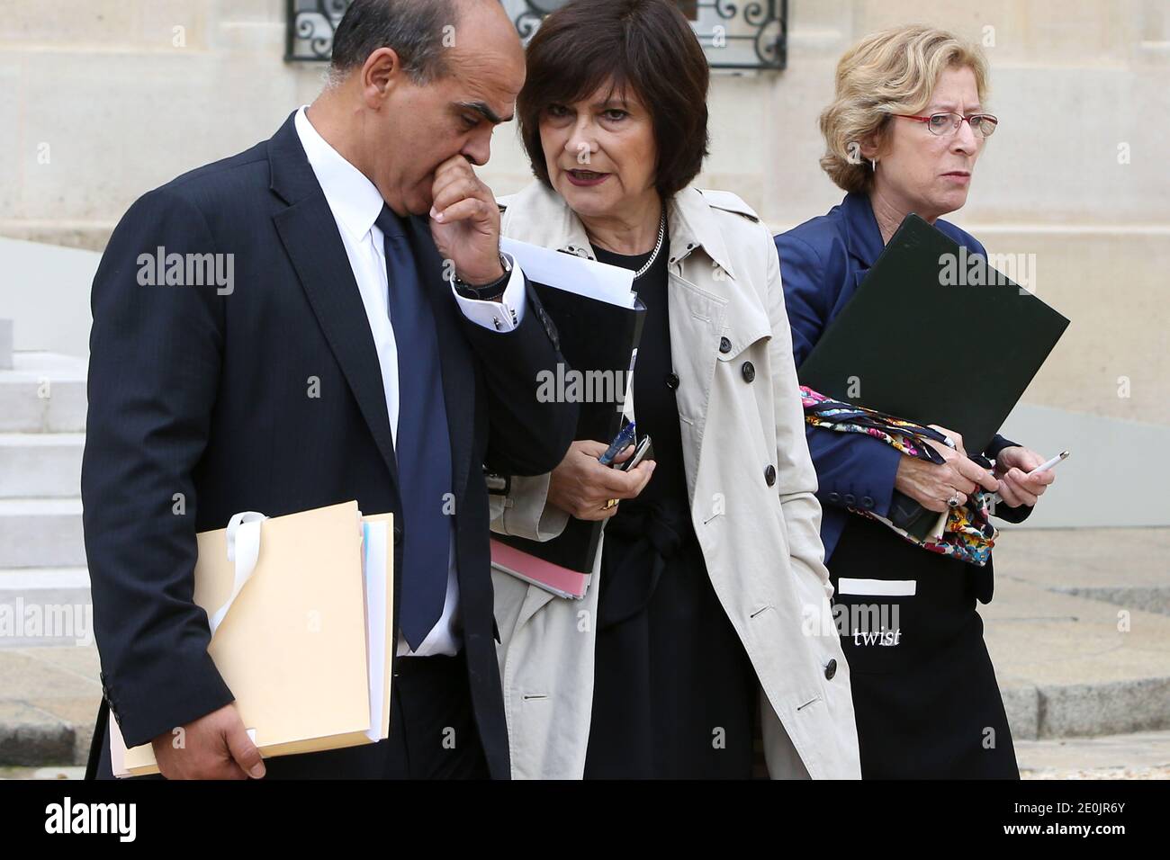 French Junior Minister for Veterans, Kader Arif, Junior Minister for Disabled People Marie-Arlette Carlotti and French Higher Education and Research Minister Genevieve Fioraso leave the Elysee Palace in Paris, France on July 11, 2012 after the weekly cabinet meeting. Photo by Stephane Lemouton/ABACAPRESS.COM. Stock Photo