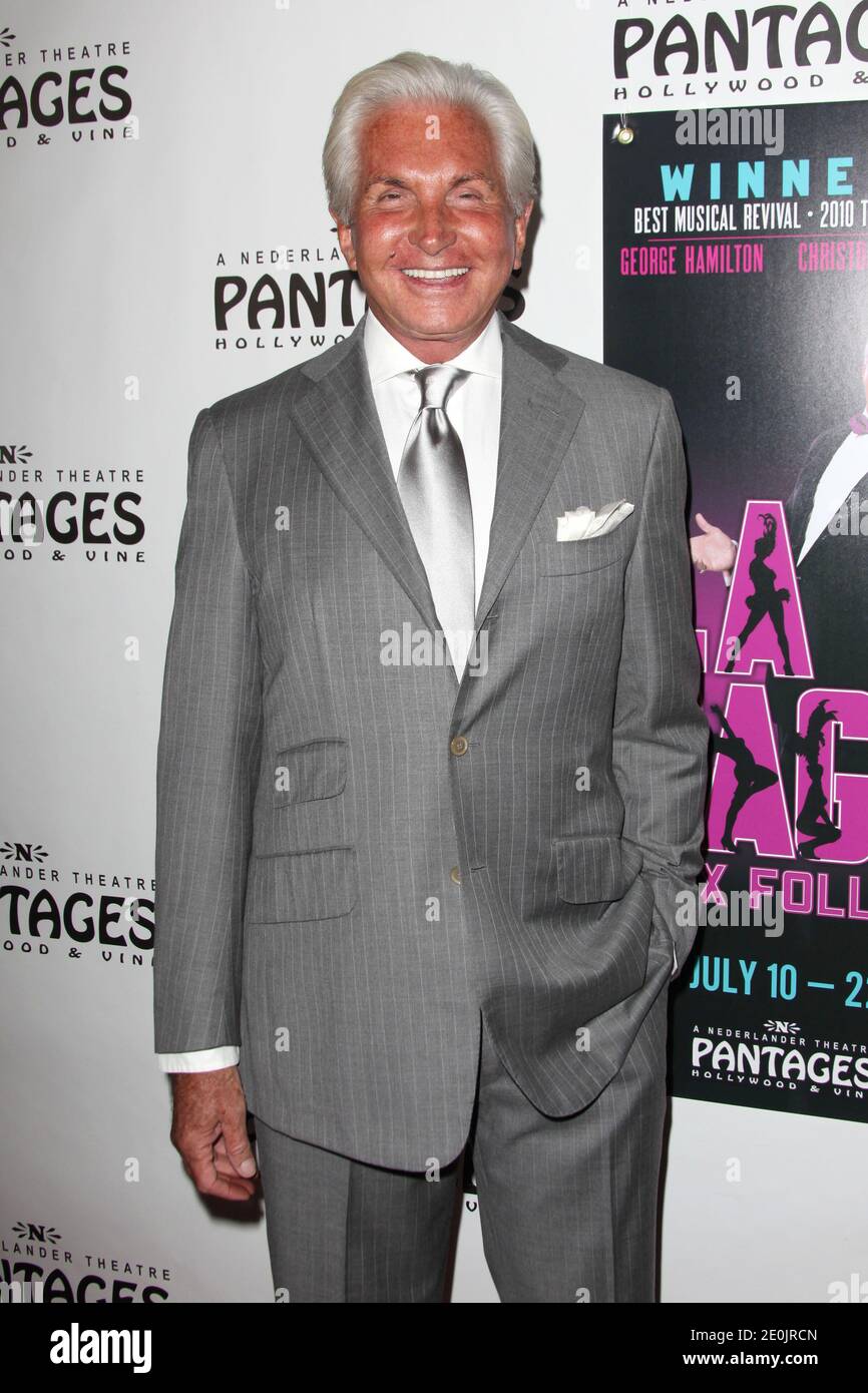 George Hamilton arriving at the opening night of Broadway musical 'La ...