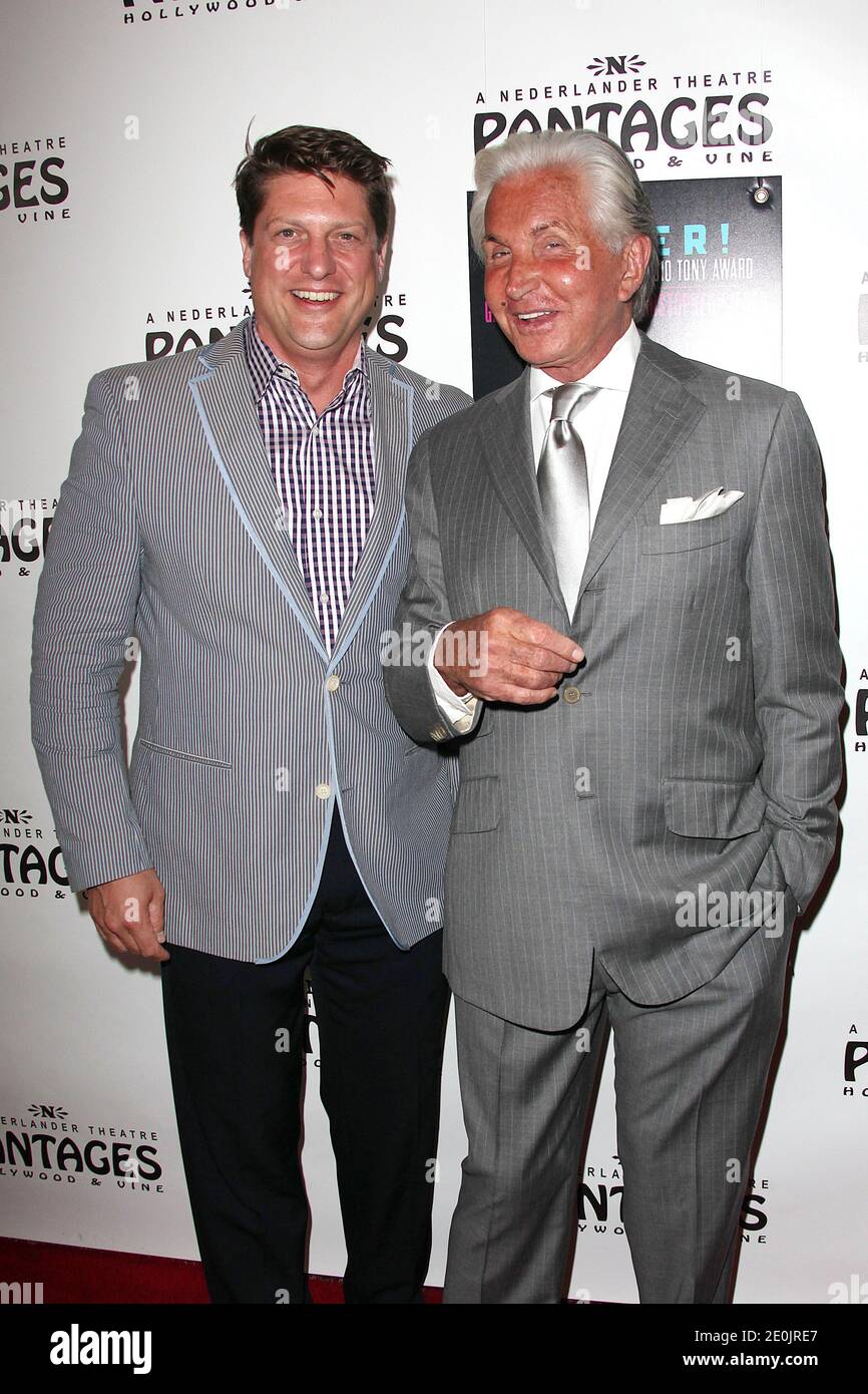 George Hamilton and Christopher Sieber arriving at the opening night of  Broadway musical 'La Cage aux Folles' held at the Pantages Theater in  Hollywood, CA, USA on July 11, 2012. Photo by