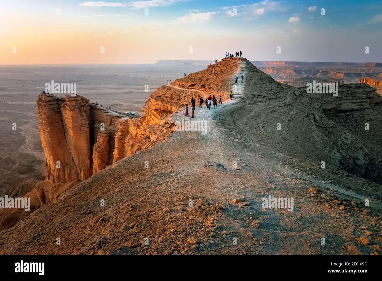 Sun rays on Edge of the World, a natural landmark and popular tourist destination near Riyadh -Saudi Arabia. Stock Photo