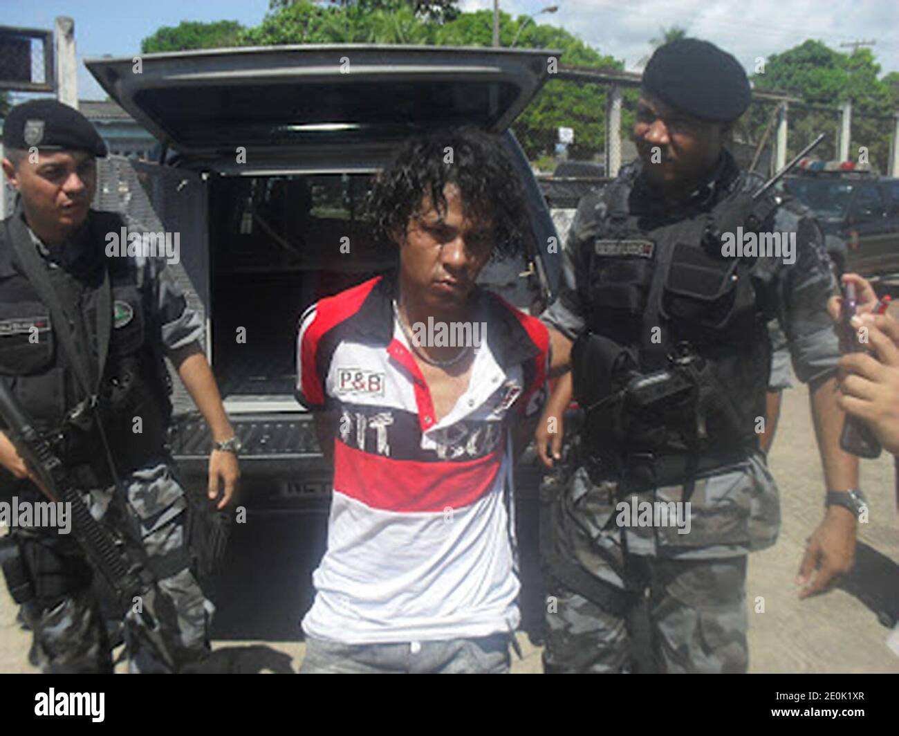 EMBARGOED FOR WEB AND APPS IN FRANCE UNTIL 14 AUGUST 2012. EXCLUSIVE. Arrestation de Manoelzinho et de son complice Brabo, a Macapa, la capitale de l'Etat amazonien d'Amapa, au Nord du Bresil, a la frontiere avec la Guyane, le vendredi 28.08.12. Accuses du meurtre de deux militaires francais, en Guyane, fin juin. In this photo: Manoel Ferreira Moura, dit 'Manoelzinho', 25 ans, nationalite bresilienne, accuse d'avoir tue deux militaires français. Arrete le 27.08.2012, par le le Bope (l'unite d'elite de la police militaire bresilienne) a Macapa, la capitale de l'Etat amazonien d'Amapa, au Nord d Stock Photo