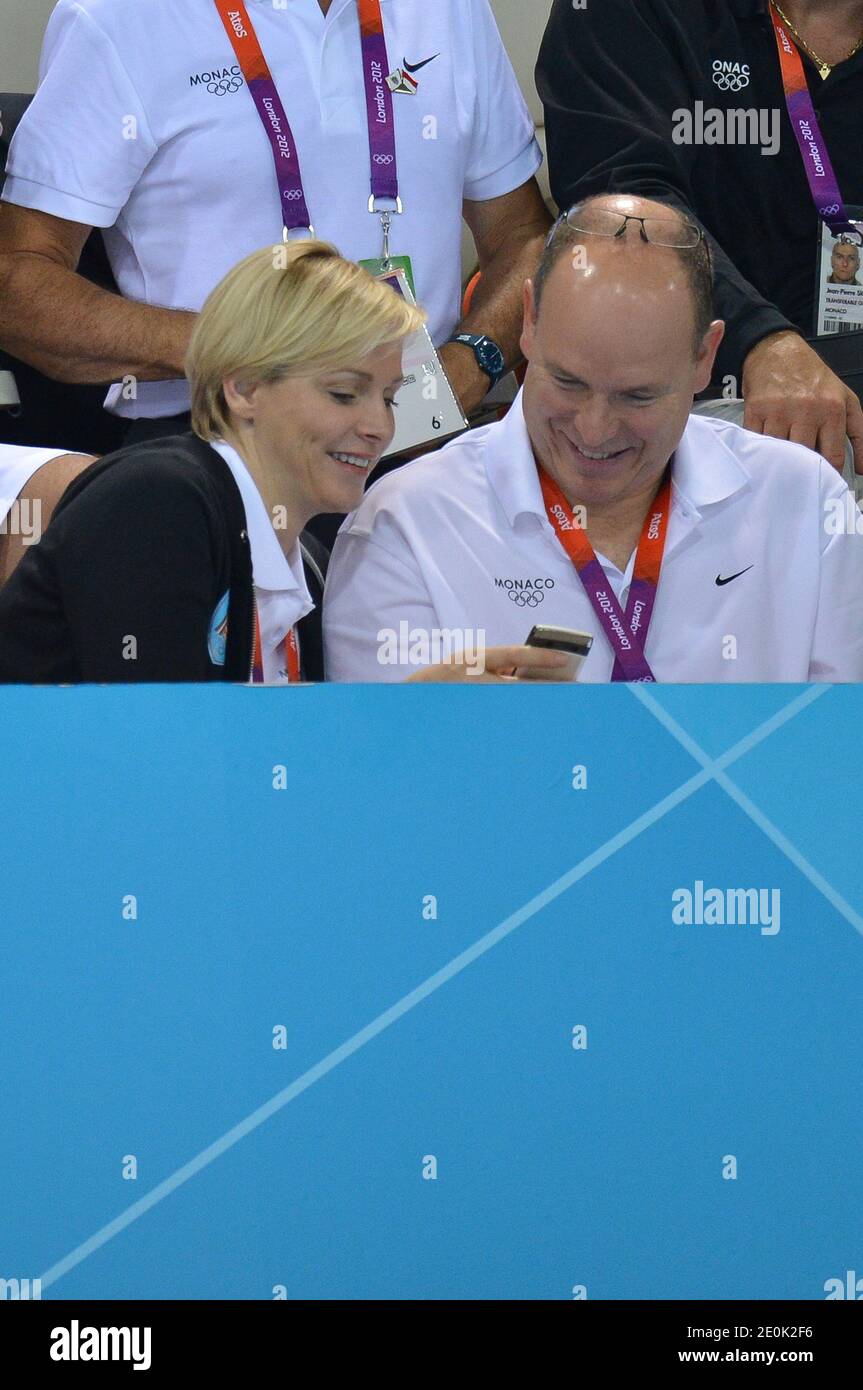Prince Albert II of Monaco and Princess Charlene of Monaco attend the swimming competitions in Aquatics Centre at the London 2012 Olympic Games in London, UK on July 29, 2012. Photo by Guibbaud-Gouhier-JMP/ABACAPRESS.COM Stock Photo