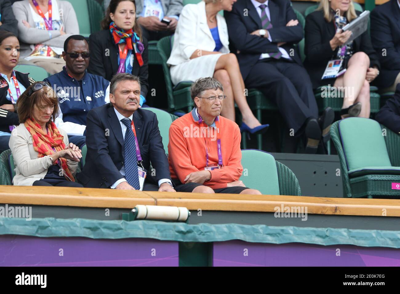 Bill Gates, Co-Chair, Bill & Melinda Gates Foundation and his wife Melinda  attend the men's Tennis Semi-Final during the 2012 London Olympic Games at  Wimbledon in London, UK on August 3, 2012.