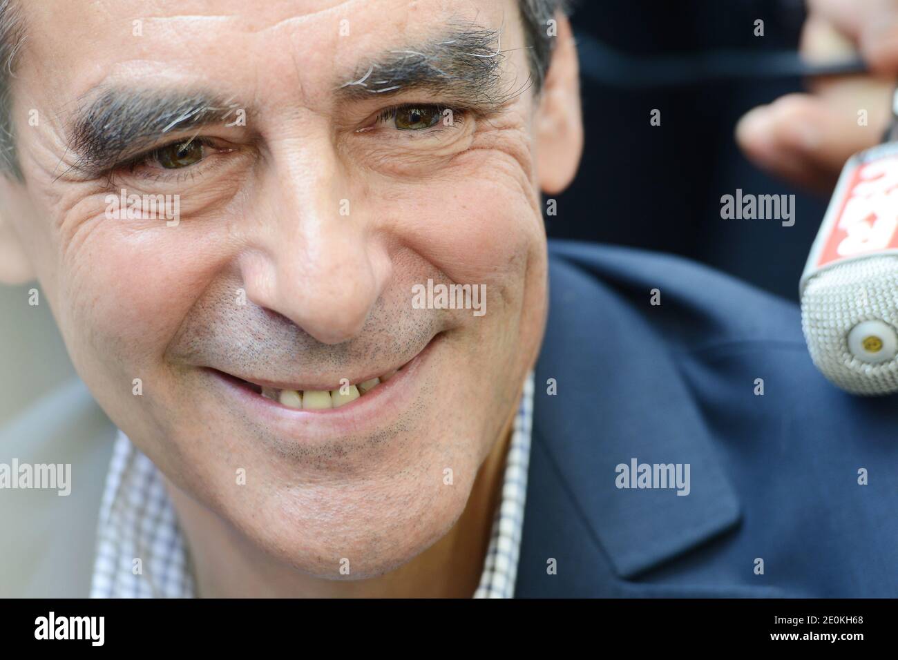 French former Prime Minister and candidate for the UMP party presidency Francois Fillon is pictured during a meeting with militants, in Saint-Denis-d'Orques, near Le Mans, western France, on August 26, 2012. Francois Fillon broke his ankle in a scooter accident during his holidays on the island of Capri in southern Italy. Photo by Mousse/ABACAPRESS.COM Stock Photo