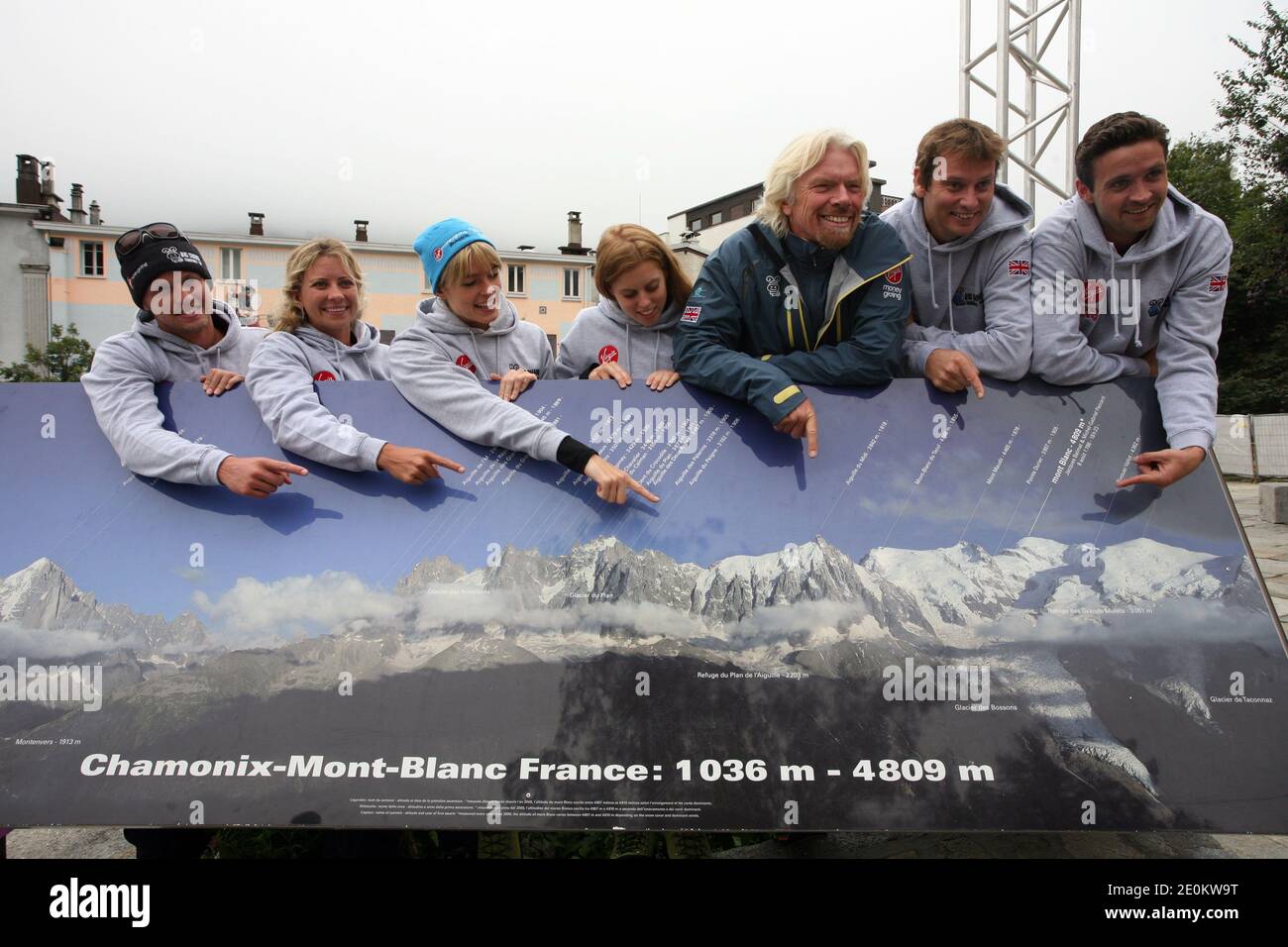 Virgin Group founder and CEO Sir Richard Branson (3rd R) poses alongside the team of The Big Change Charitable Trust, (L-R) Sam Branson, Holly Branson, Sam's fiancee Isabella Calthorpe, Princess Beatrice of York, Sam Richardson and Phil Nevin, in Chamonix, French Alps on September 3, 2012. Sir Richard joined the team in their attempt to climb Western Europe's highest mountain, Mont Blanc. Founded by Branson's children Holly and Sam along with their friends, the Trust works in partnership with charitable projects throughout the UK, assisting them in their mission to inspire and encourage young Stock Photo