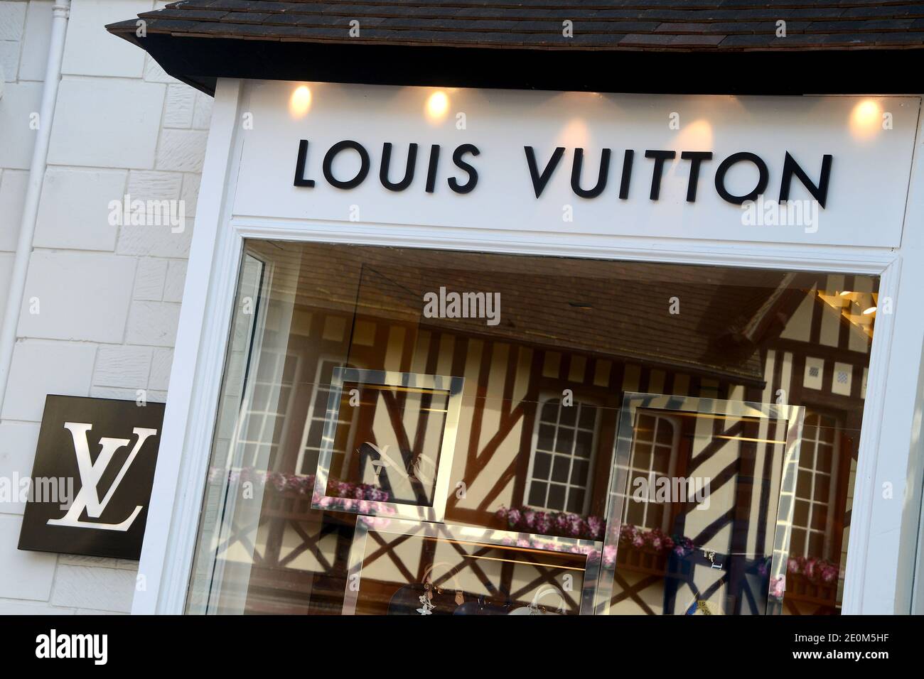Illustration of Louis Vuitton (LVMH) shop in Deauville, France on