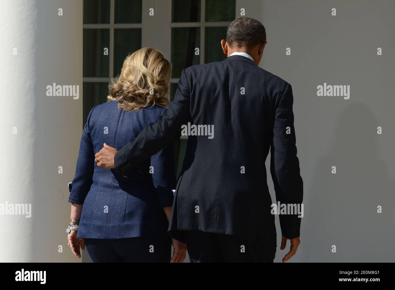US President Barack Obama (R) walks out of the Rose Garden with US Secretary of State Hillary Clinton (L) after delivering remarks on the killing of US ambassador to Libya, Christopher Stevens, and three embassy staff, at the White House in Washington DC, USA on September 12, 2012. Gunmen attacked the US consulate in Benghazi, killing US ambassador to Libya, Christopher Stevens, late 11 September 2012, while another assault took place on the US embassy in Cairo. Photo by Michael Reynolds/Pool/ABACAPRESS.COM Stock Photo