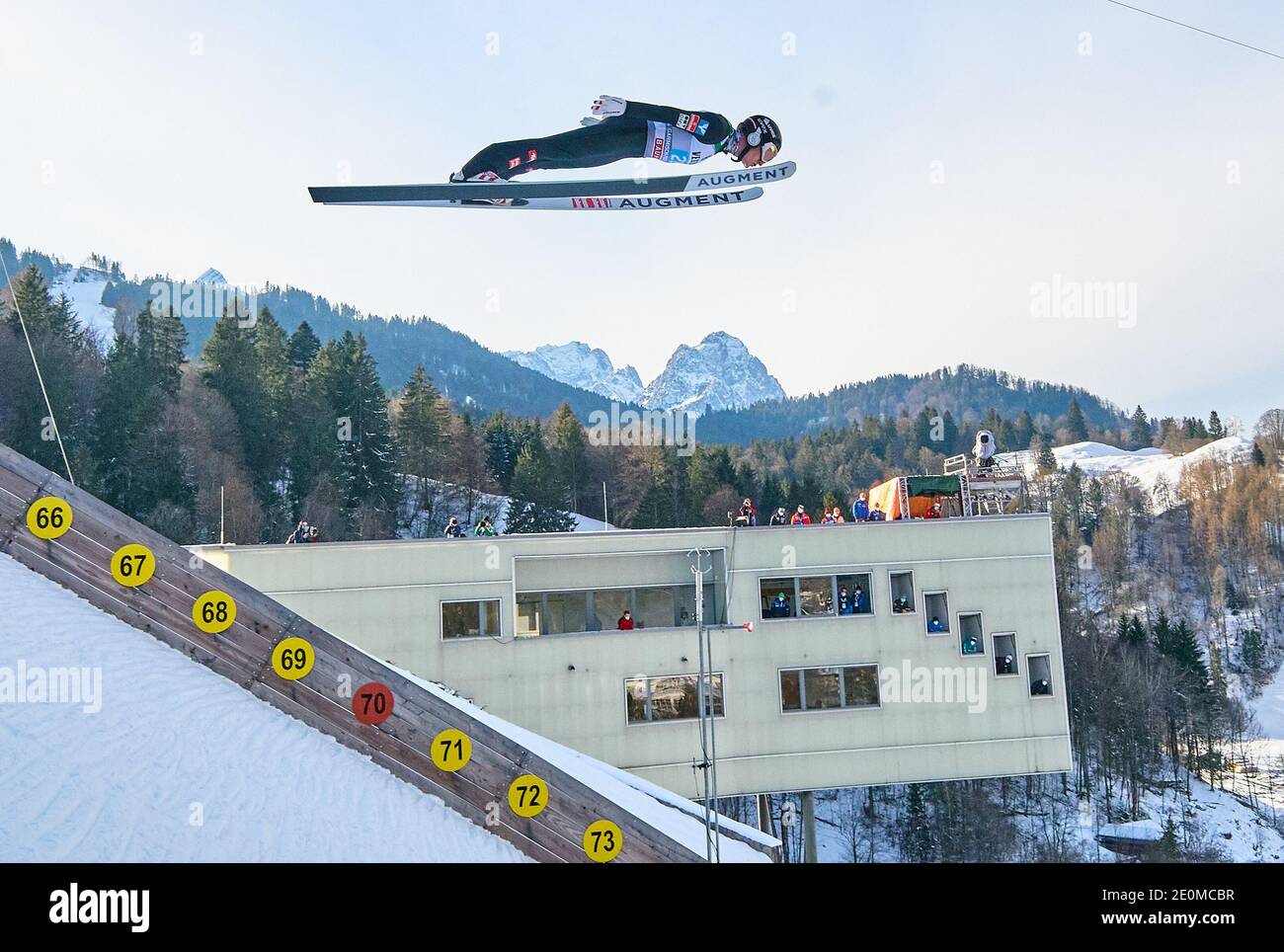 Markus SCHIFFNER, AUT in action  in front of Zugspitze mountain at the Four Hills Tournament Ski Jumping at Olympic Stadium, Grosse Olympiaschanze in Garmisch-Partenkirchen, Bavaria, Germany, January 01, 2021.  © Peter Schatz / Alamy Live News Stock Photo
