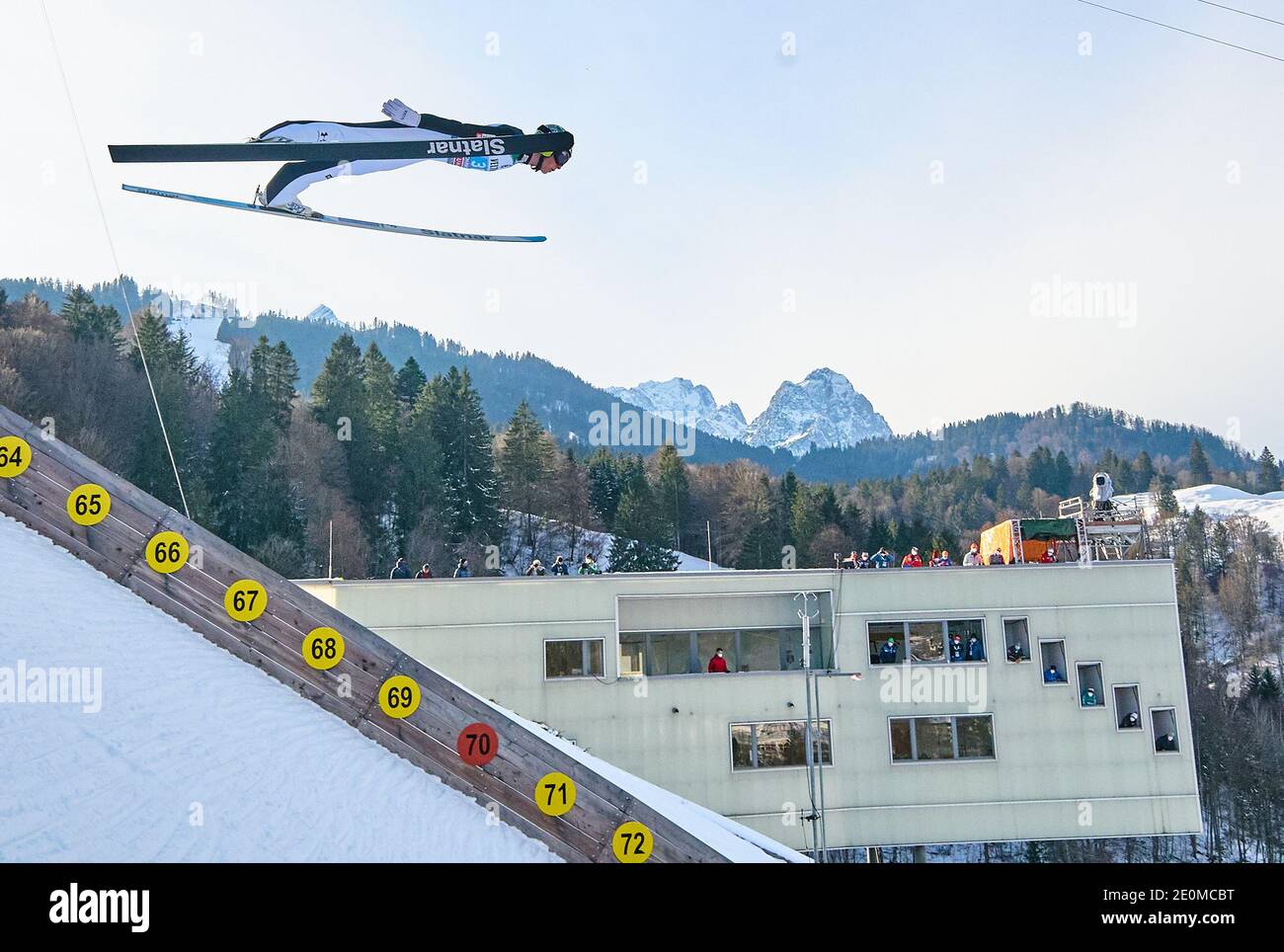 Bor PAVLOVCIC, SLO in action  in front of Zugspitze mountain at the Four Hills Tournament Ski Jumping at Olympic Stadium, Grosse Olympiaschanze in Garmisch-Partenkirchen, Bavaria, Germany, January 01, 2021.  © Peter Schatz / Alamy Live News Stock Photo