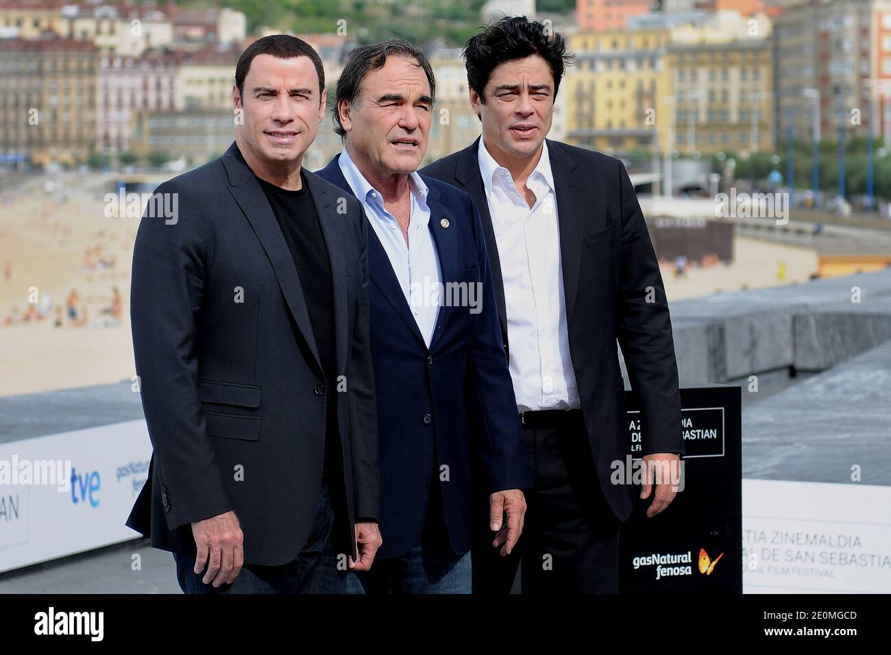 Oliver Stone (C)with actors Benicio del Toro (L) and John Travolta (R) attend the photocall for 'Savages' at San Sebastian Film Festival in San Sebastian, Spain on September 22, 2012. Photo by Julien Pascual/Photomobile/ABACAPRESS.COM Stock Photo