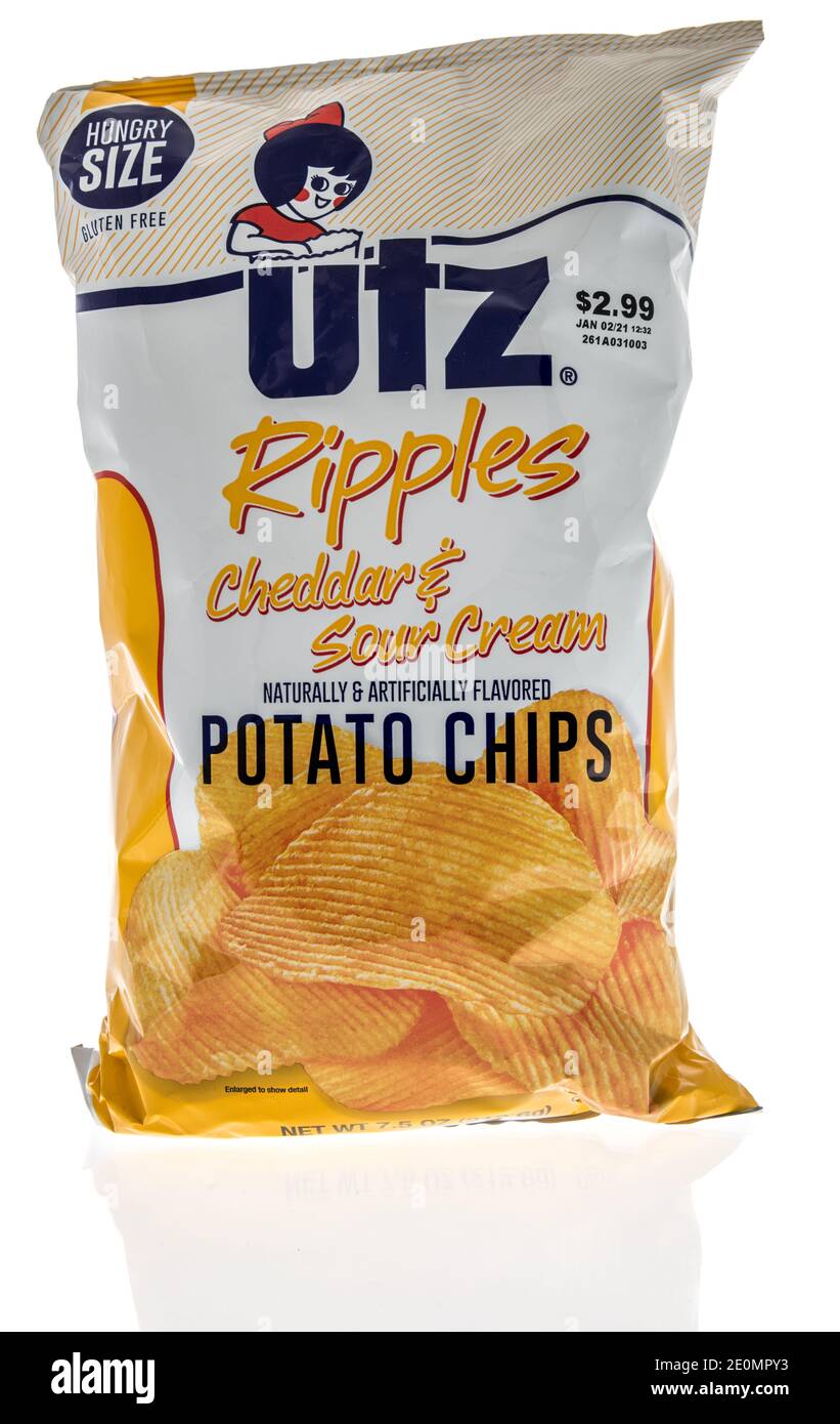 Winneconne, WI -30 December 2020: A package of Utz ripples potato chips on an isolated background. Stock Photo