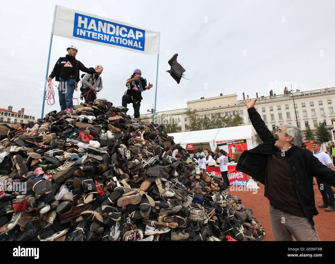 Jean-Baptiste Richardier, Founder of the Handicap International agency and  member of the international campaign for the ban on antipersonnel land  mines organised the pyramid of shoes at Bellecour square in Lyon, France