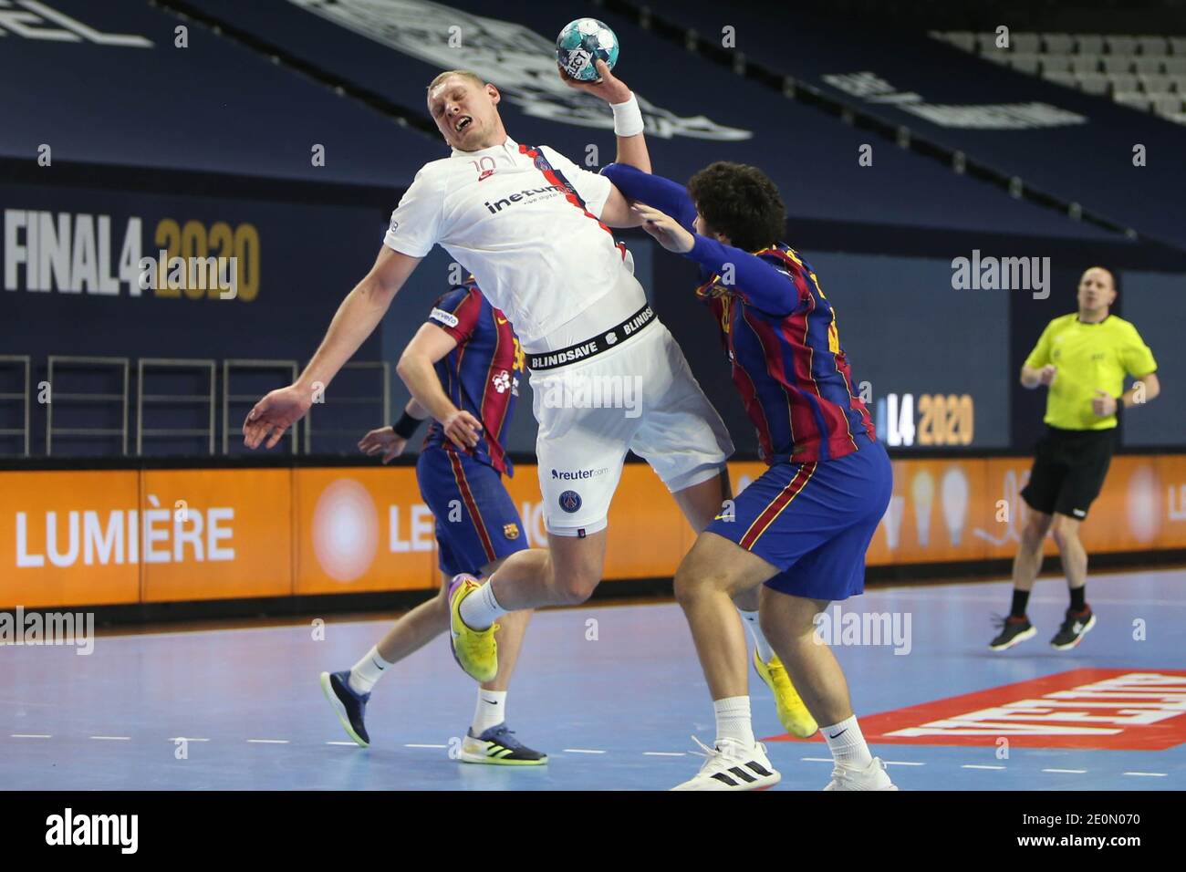 Luis Frade of FC Barcelone and Dainis Kristopans of Paris Saint Germain  during the 2020 EHF Champions League, Final Four semi final handball match  between FC Barcelona and Paris Saint-Germain on December