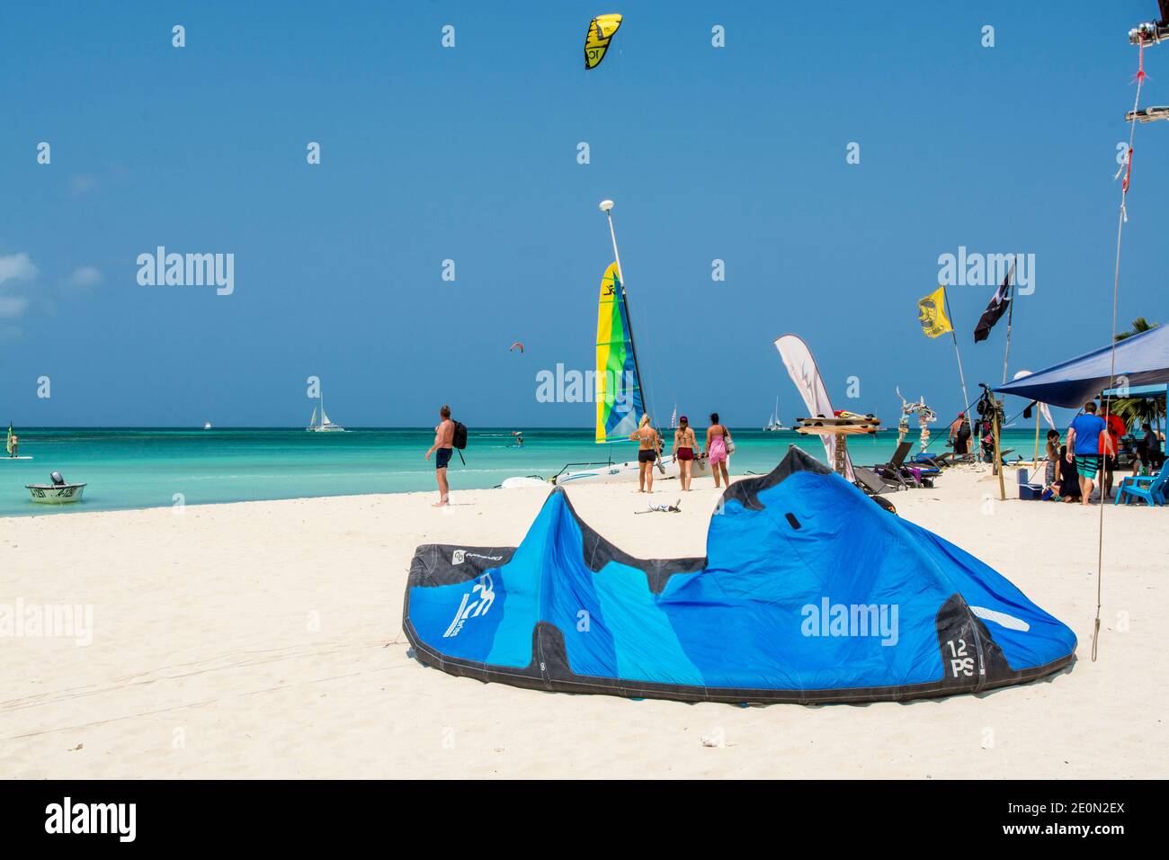 Windsurfing kitesurfing kiteboarding on Hadicurari Beach, Aruba. Stock Photo