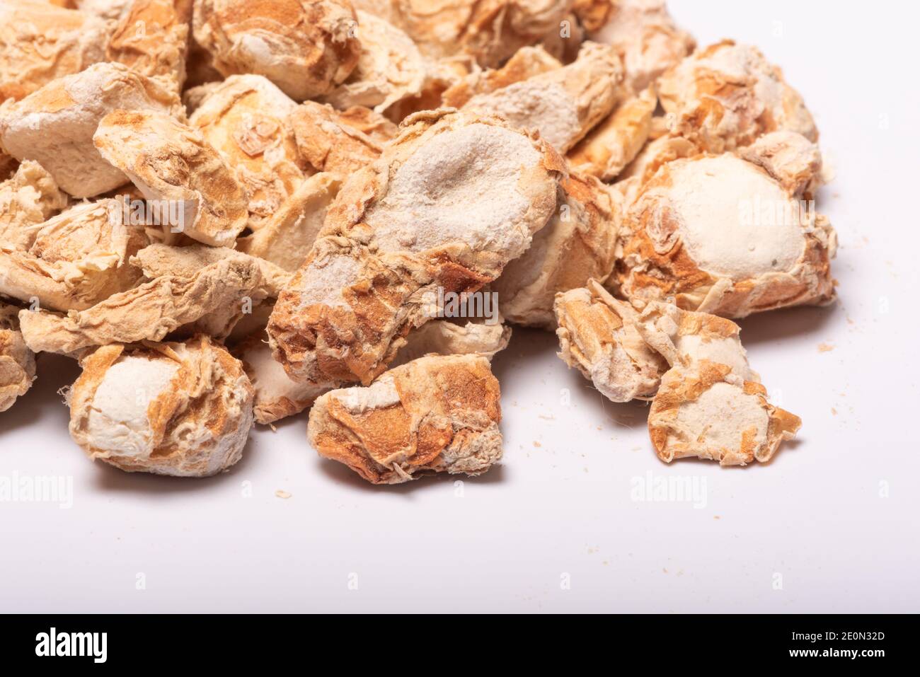 Sand ginger, latin name Kaempferia galanga dried roots heap closeup