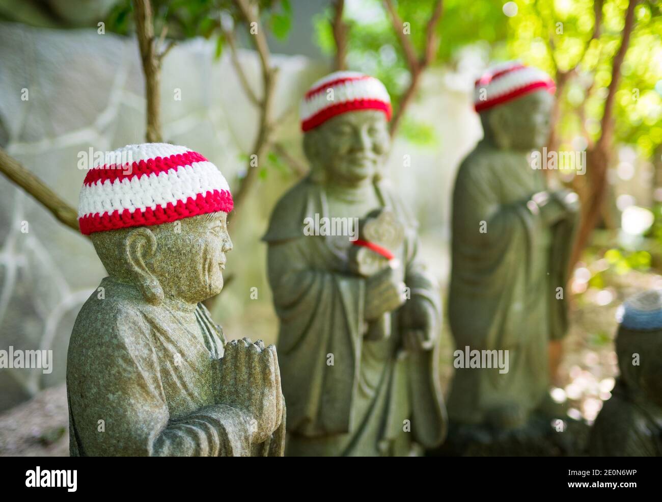 Statues of the original followers of Buddha (called Shaka Nyorai in Japan), with knitted caps at Daisho-in Temple (Daishoin Temple), Miyajima, Japan. Stock Photo