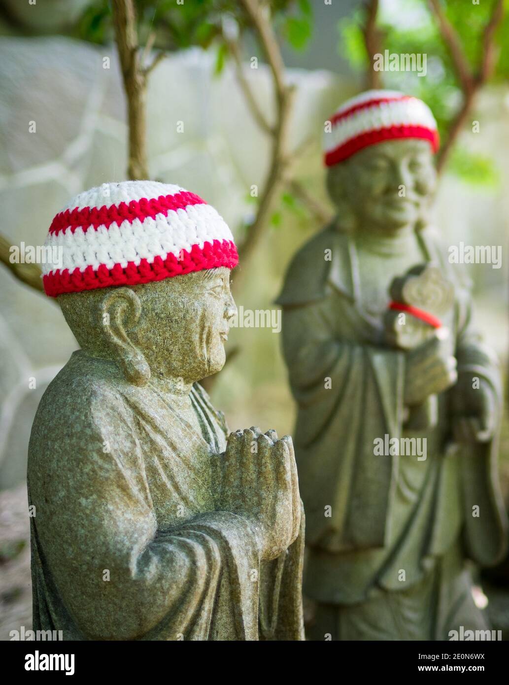 Statues of the original followers of Buddha (called Shaka Nyorai in Japan), with knitted caps at Daisho-in Temple (Daishoin Temple), Miyajima, Japan. Stock Photo