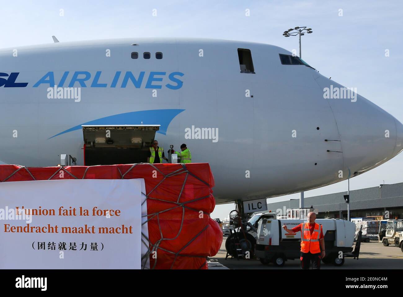 Beijing, Belgium. 16th Mar, 2020. Chinese medical supplies for Belgium are unloaded at the Liege Airport in Liege, Belgium, on March 16, 2020. Credit: Zhang Cheng/Xinhua/Alamy Live News Stock Photo