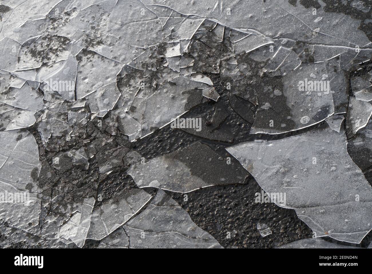 Mortara -12/29/2020: ice cracked on the road Stock Photo
